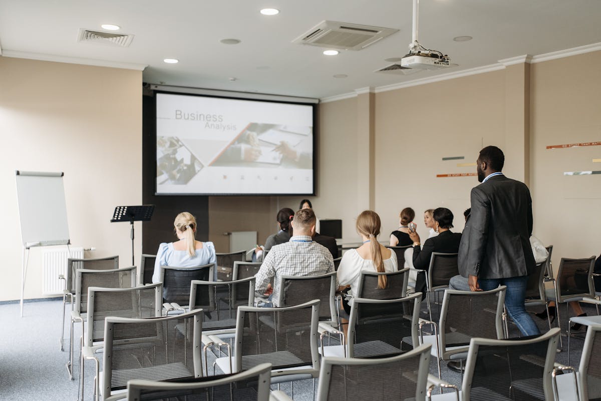 Presenter using slides during a business presentation